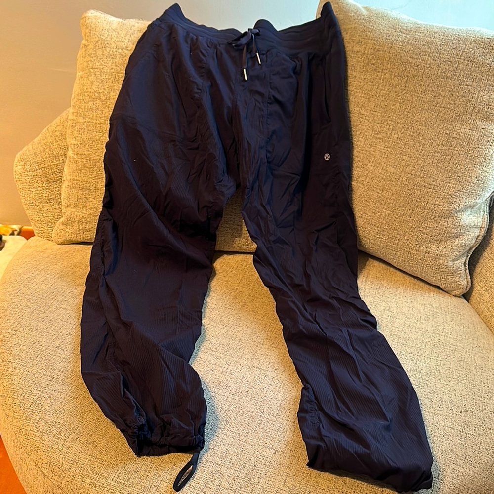 Lululemon size 12 navy blue, unlined, studio pant with drawstring